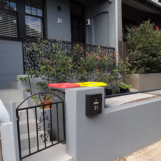Bins out the front of a residential house